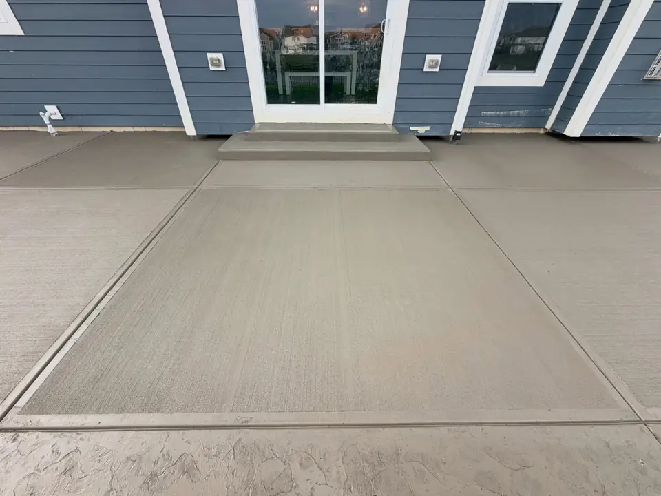 Finished concrete patio adjoining a home